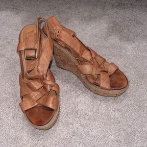 Worn in tan wedges